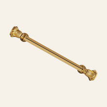 Anzer faceted solid brass pull handle in flared foliate cups