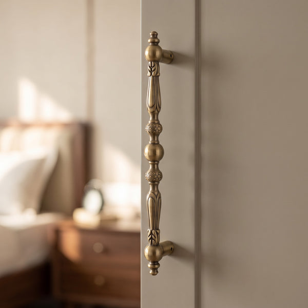Artemis Solid Brass Pull Handle in Antique, 18-inch, fitted on a wardrobe door