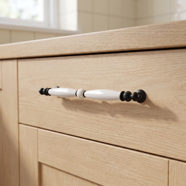 Elara Slender Bar Handle in PEARL+BLACK, 224mm, fitted on a kitchen drawer