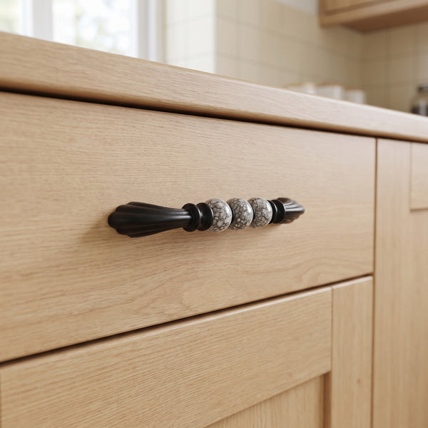 Florentine Bead Bar Handle in BLACK PEARL, 128mm, fitted on a kitchen drawer