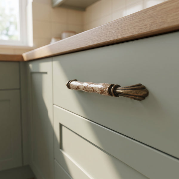 Perla Bead Bar Handle in BROWN+AB, 224mm, fitted on a kitchen drawer