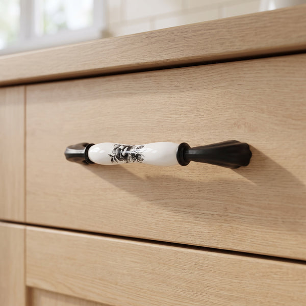 Lumiere Floral Painted Bar Handle in Black, 160mm, fitted on a kitchen drawer