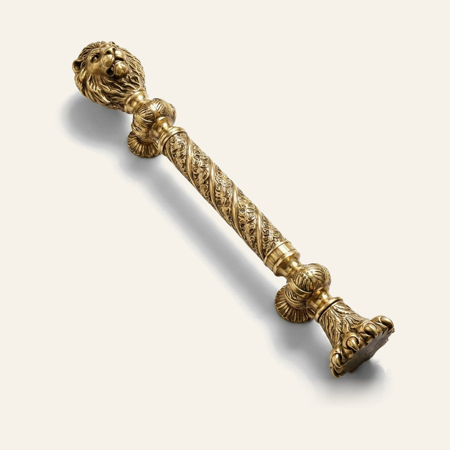 Leonidas solid brass pull handle with lion head and acanthus grip, antique finish