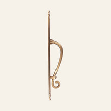 Tokyo scroll solid brass pull handle on slim reeded plate